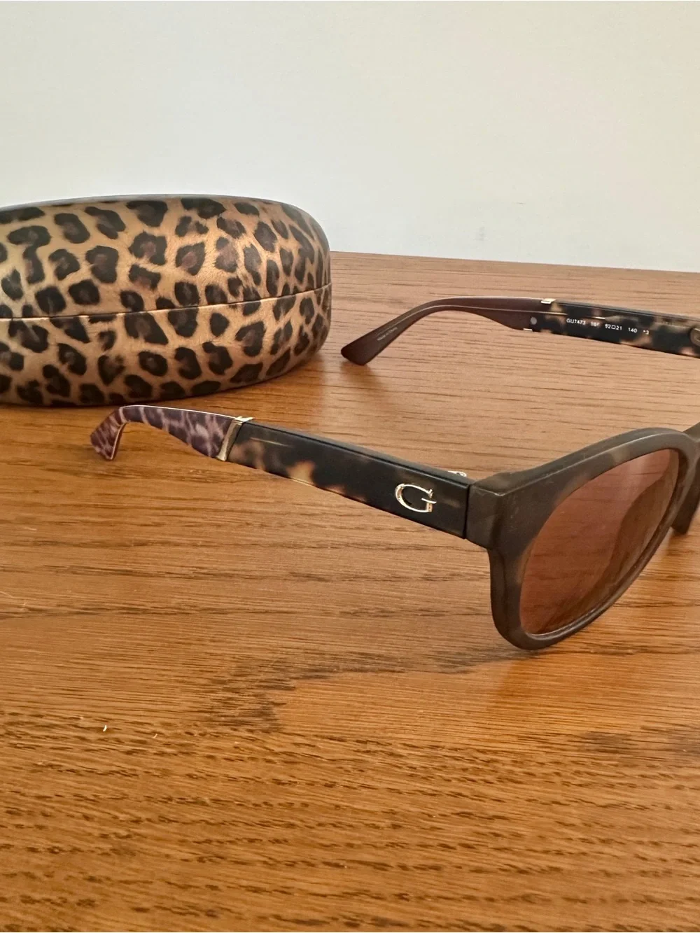 Guess sunglasses featuring